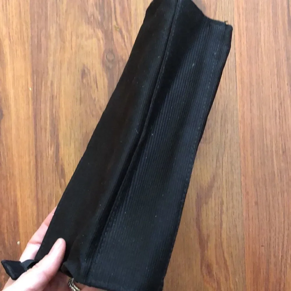 MAC Cosmetics black and purple bag.